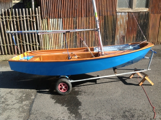 Blue Mirror dinghy unrigged on trolly